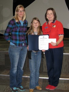 Sibley Brawley, pictured here with her teacher Dessa Fromer and ALA Unit 44 President Sharon Pierson, receives her Certificate and $50 check.